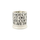 A front view of a white mug with black writing on a white background