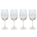 A set of four red wine glasses.
