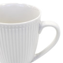 A close up view of the mugs ribbed pattern.