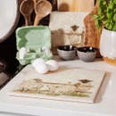 A view of a large marble platter with sheep on it