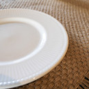 A close up view of the plate's ribbed edge.