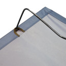 Close-up of a tent's fabric edge with a curved metal pole and a brown fabric loop for securing the structure.