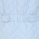 A close up view of the quilted design at the back of the gilet.