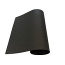 A rolled black rubber mat with a textured surface, positioned at an angle to showcase its design and thickness.