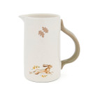 A view of a large ceramic Cooksmart Forest Fable serving jug with a leaping hare design on a white background