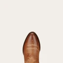 Top view of a polished brown leather cowboy boot with intricate stitching, featuring a pointed toe and decorative accents.