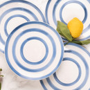 A view of blue striped Mary Berry dinner plates on a table