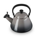 A grey stovetop kettle with a black handle A grey stovetop kettle with a black handle