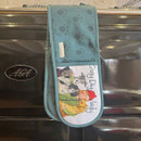 A teal oven glove featuring the phrase "Crazy Dog Lady" with a cheerful illustration of a girl surrounded by playful dogs.