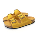 A pair of yellow sandals with two buckle over the front