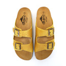 The yellow sandals from above with a cork footbed