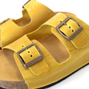 A close up of the buckled sandals