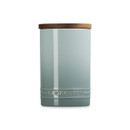 A light blue storage jar from the side.