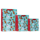 A collection of three blue gift bags with a festive puppy print.