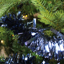 A close up view of navy 2 meter chunky tinsel on a Christmas tree
