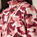 A close up front view of a pink camo regatta quarter zip fleece
