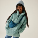 A front view of a fluffy green quarter zip fleece