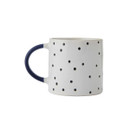 A white mug with mini Navy spots and handle.