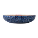The side of the bowl with a dark blue design.