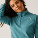 A close up view of the half zip neckline.