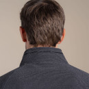 Close-up of collar on men’s dark grey fleece pullover with subtle Craghoppers branding.
