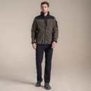 Outdoor outfit featuring khaki fleece jacket with black details, black trousers, and hiking boots.