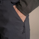 Close-up of zippered pocket on men’s grey walking trousers with embroidered Craghoppers logo.