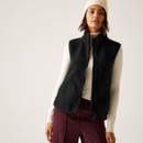 A woman wearing a black borg gilet.