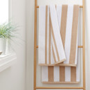 A view of natural striped Bianca Fine Linens bath towel a hook A view of natural striped Bianca Fine Linens bath towel a hook
