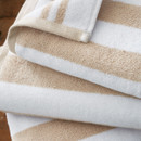 A close up view of natural striped Bianca Fine Linens hand towel, bath towel and bath sheet A close up view of natural striped Bianca Fine Linens hand towel, bath towel and bath sheet