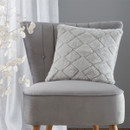 A view of a silver Catherine Lansfield diamond cushion on a chair