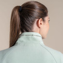 Close-up of Craghoppers logo embroidered on the back collar of a mint green fleece.