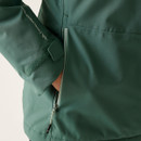 A close up view of the jacket's zipped side pocket.