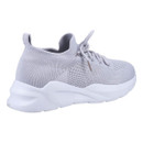 A grey lace up trainer with a white sole.