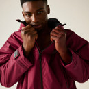 A man wearing a dark red Regatta changing robe.