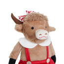 Close-up of plush Christmas Highland Cow Girl decoration, showing soft fur, red striped bow, white collar, and red suspender skirt against a white background.