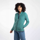 A woman wearing a light green full zip fleece with a high collar.