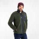 A man wearing a green fleece jacket and a maroon beanie stands with hands in pockets against a plain background, conveying a casual and cosy vibe.