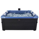 Front-facing view of the MSpa Oslo Sapphire 4–6 Person Hot Tub with bubbling water, padded headrests, and the digital control panel visible at the back.
