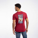 The back of a man wearing a short-sleeved red t-shirt with a large 'Only Fowls and Hawkses' print across the back.