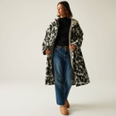 A full length view of a woman wearing a leopard print robe. A full length view of a woman wearing a leopard print robe.