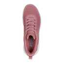 A top down view of a pink lace up trainer.