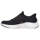 Side view of a black Skechers Slip-ins trainer with a quilted textile upper, rose gold eyelets and a thick white sole.