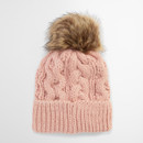 A pink knitted beanie with a chunky cable pattern and a fluffy brown faux fur pom-pom on top, conveying a cosy and stylish winter feel.