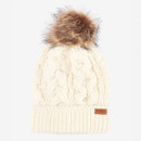 Cream knit beanie with a cable pattern and a brown faux fur pom-pom on top. A small leather tag is sewn on the cuff, giving it a cosy, winter feel.