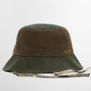 Two-tone green and brown bucket hat with a plaid chin strap, resting against a plain white background. The hat has a casual, outdoor style.