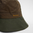 Close-up of a Barbour bucket hat in olive and brown. The hat features the Barbour logo on the side, conveying a casual and outdoorsy vibe.