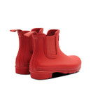 The back of a pair of bright red Chelsea boot Hunter wellingtons.