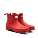 A pair of bright red Chelsea boot Hunter wellingtons.