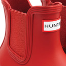 A close up view of the wellingtons elastic gusset and Hunter logo.